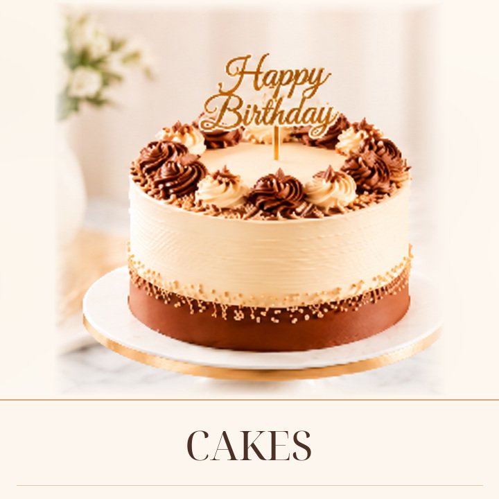 Cakes — premium birthday cake with Happy Birthday topper from Magic Bakers, Palakkad